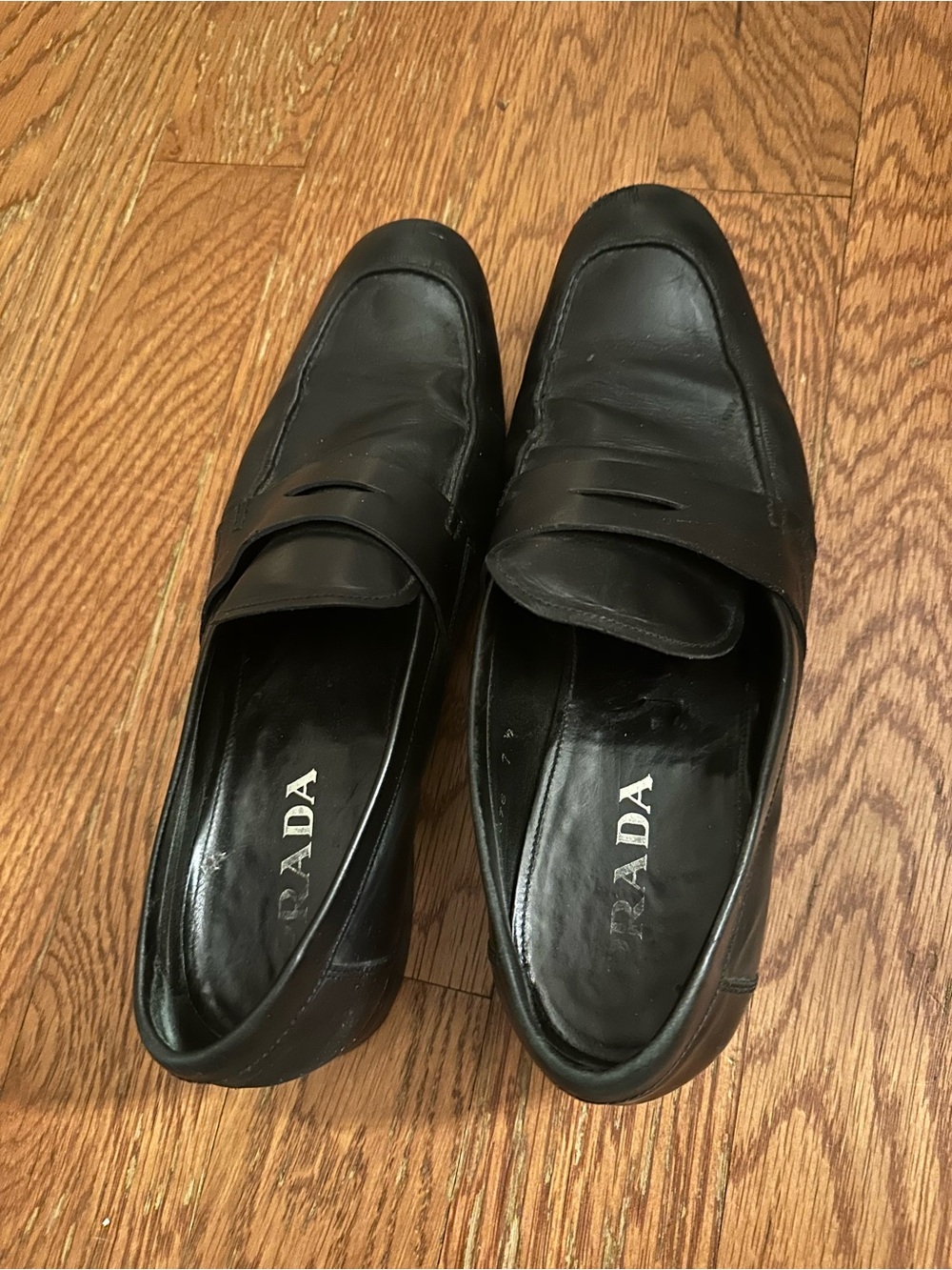 Prada Black Leather Penny Loafers